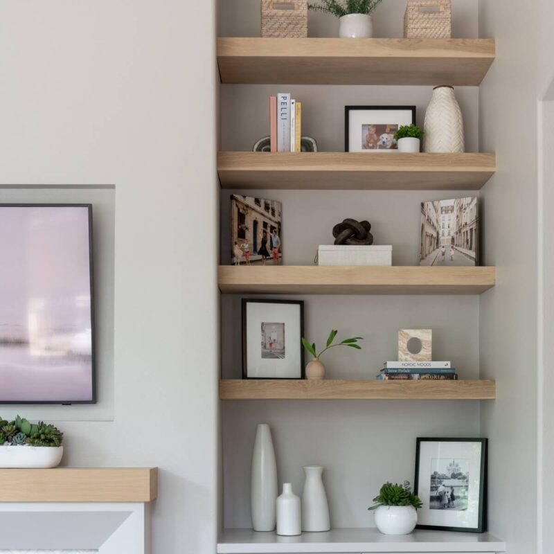 Built-in bookshelves with books and decor