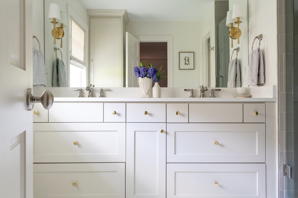 View of dual sink counter top from bathroom entryway